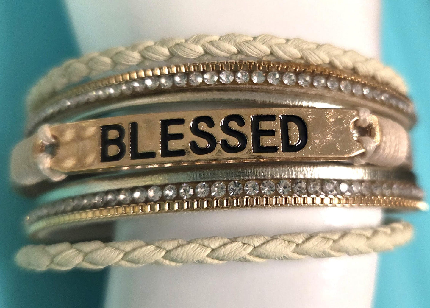 Beautiful Multi Strand Boho Bracelet with Magnetic Clasp adorned with Blessed with Rhinestones and Cream Twist Rope