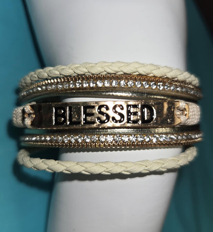 Beautiful Multi Strand Boho Bracelet with Magnetic Clasp adorned with Blessed with Rhinestones and Cream Twist Rope